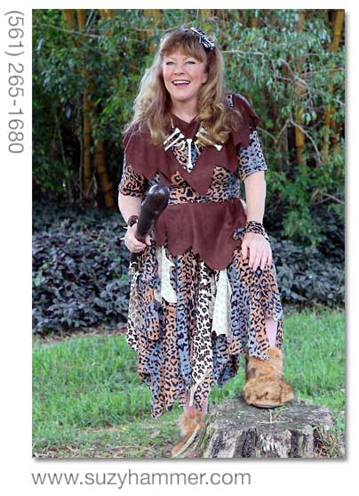 Suzy Hammer posing as Oooga, a prehistoric reader.